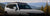 White Lexus GX550 equipped with an LFD Off Road roof rack on a mountain trail