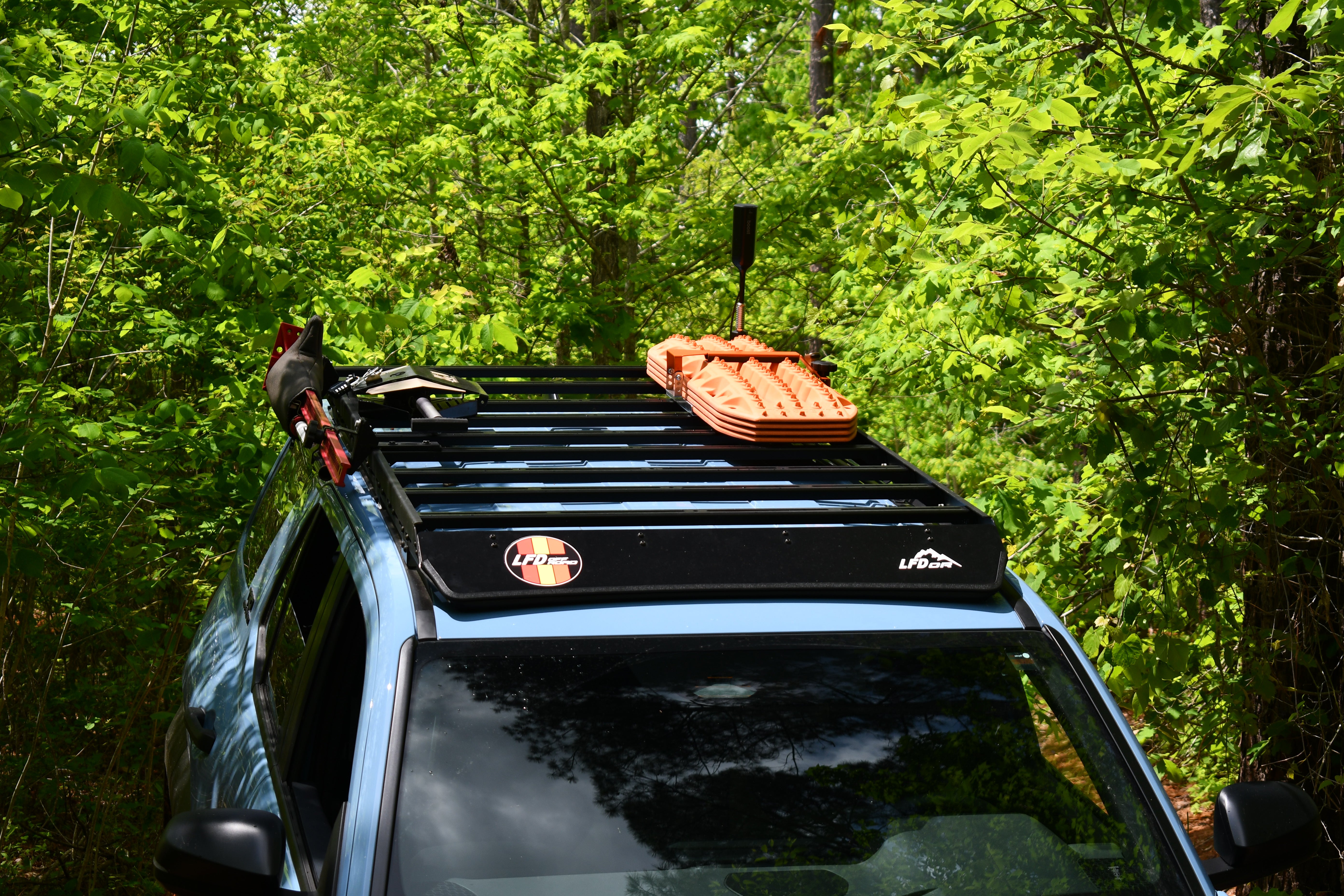 6th Gen Toyota 4Runner with LFD roof rack on forest trail