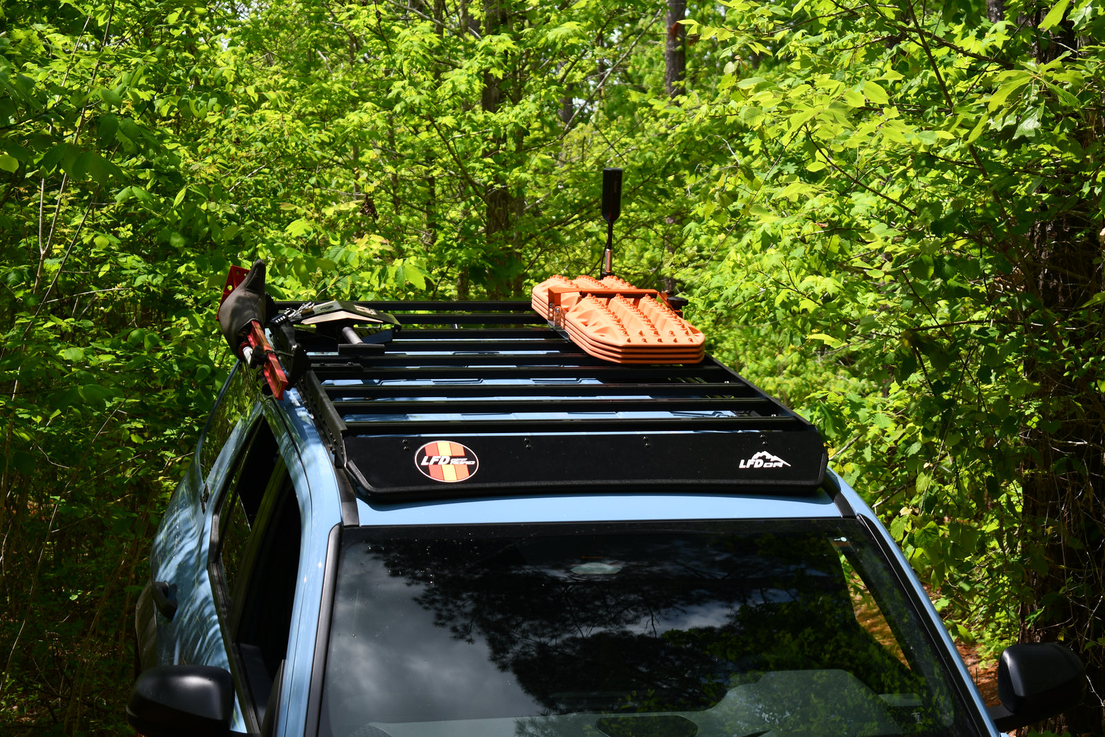 6th Gen Toyota 4Runner with LFD roof rack on forest trail