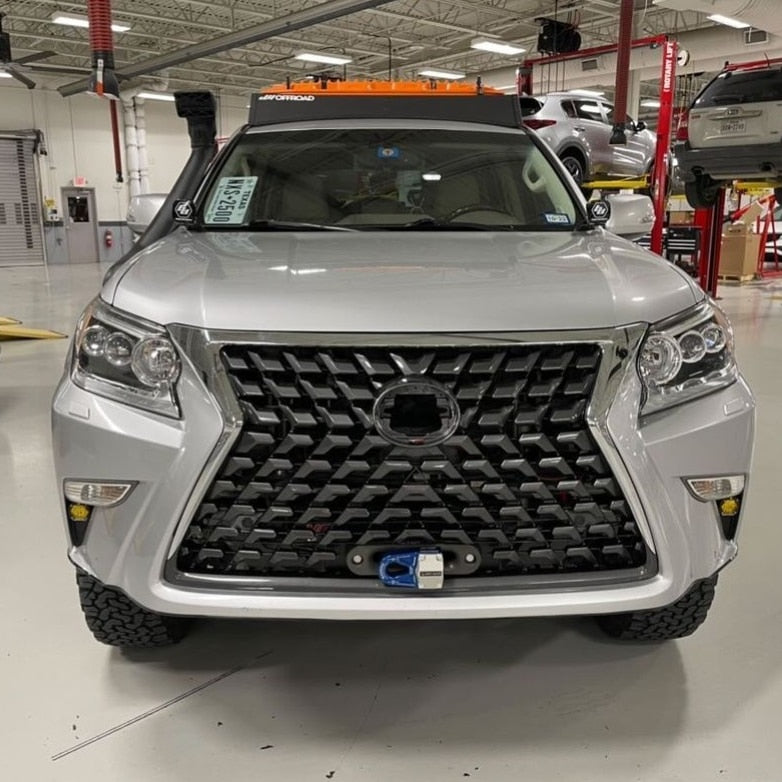 Front view of a Lexus GX460 SUV with an adjustable hidden winch mount installed on the front bumper.