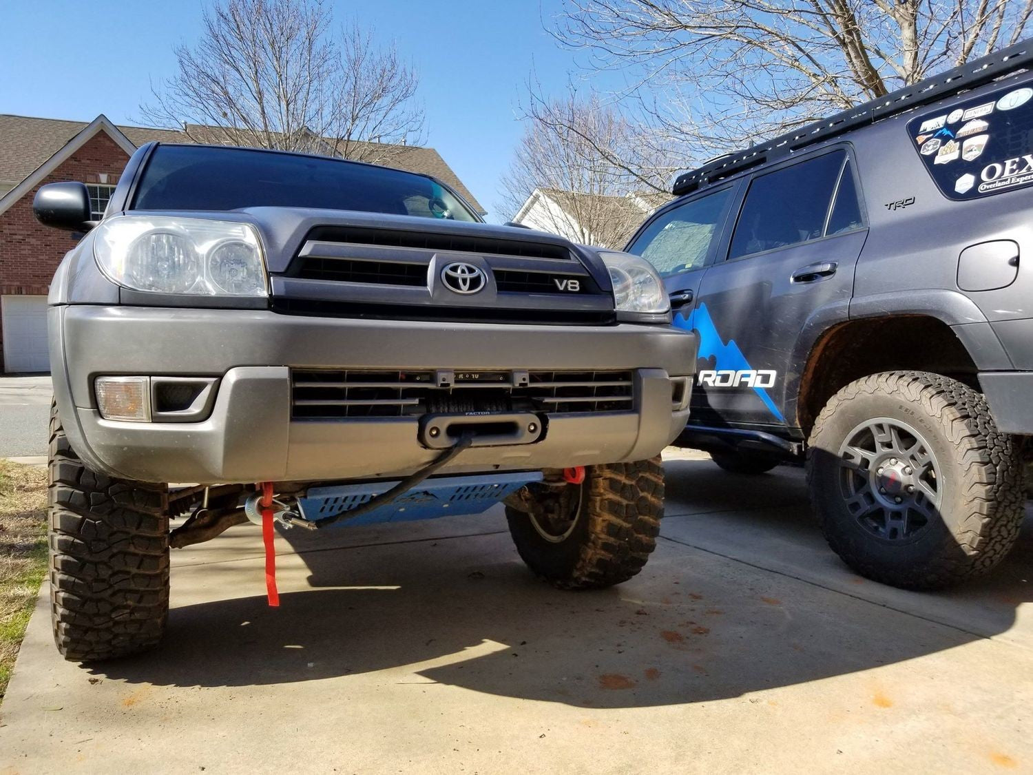 A silver 4th Gen 4Runner with a winch mount visible on the front bumper.