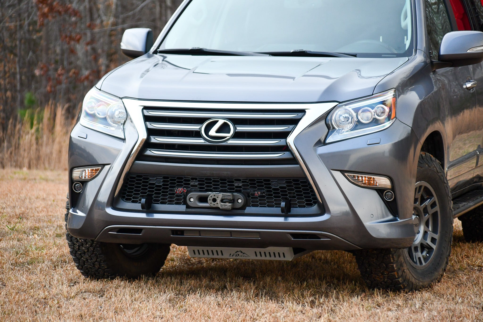 Front bumper area of a GX460 Lexus SUV with an adjustable hidden winch mount installed